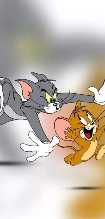 Tom chasing Jerry in a playful cartoon scene mobile wallpaper.