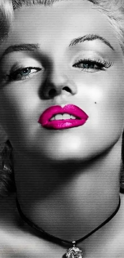 Black and white portrait with vivid pink lips on a mobile wallpaper.