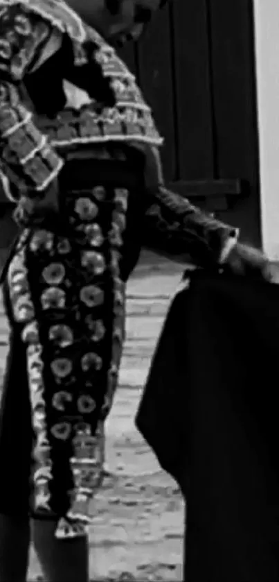 Black and white wallpaper of a matador in traditional attire.