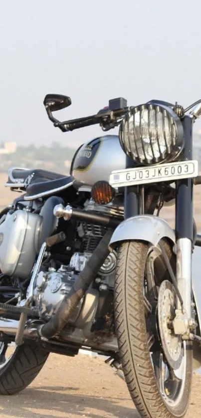 Classic motorcycle parked along a scenic view.