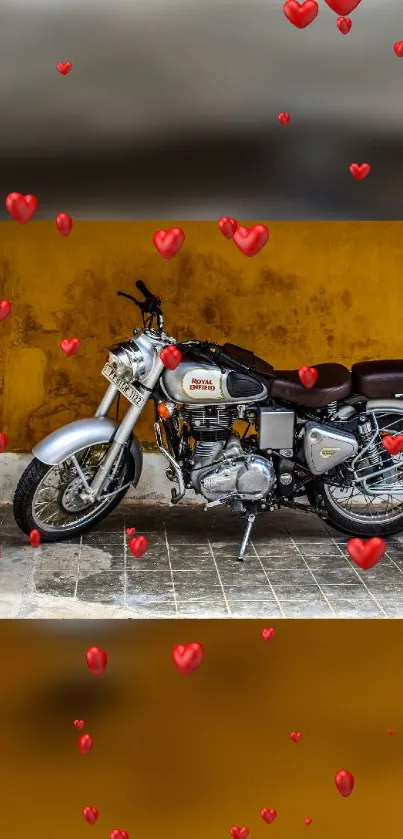 Classic motorcycle with red hearts on yellow wall background.