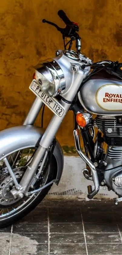 Royal Enfield motorcycle against yellow background.