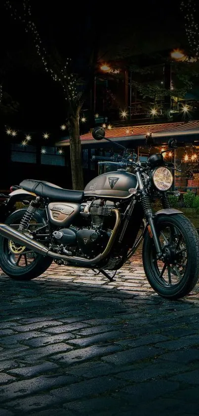 Classic motorcycle parked at night under glowing streetlights.