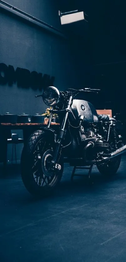 Classic motorcycle in a dimly lit garage, highlighting vintage aesthetics.