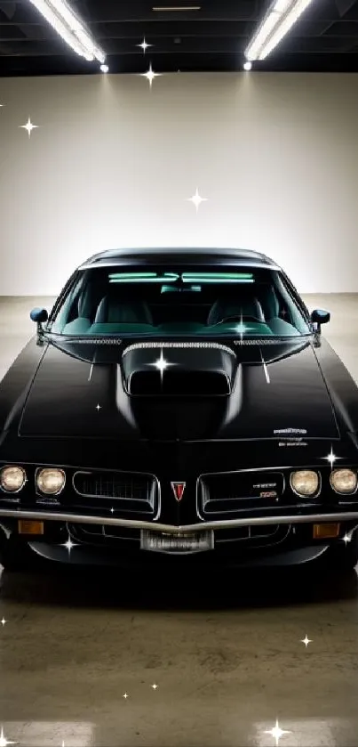 Black classic muscle car with a sleek, vintage design in a garage.