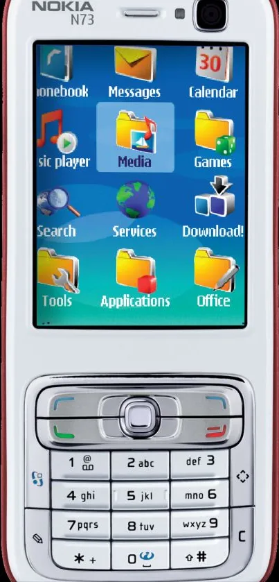 Vintage Nokia N73 mobile phone screen showing classic icons.