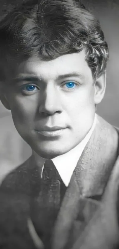 Black and white portrait with striking blue eyes.