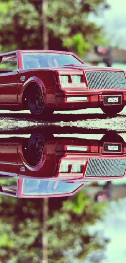 Classic red car with reflection on glossy surface.