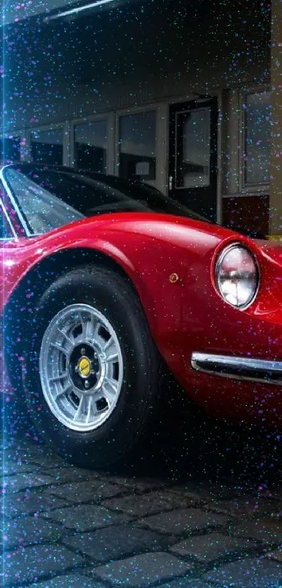 Classic red car parked on cobblestone street, perfect for phone wallpaper.