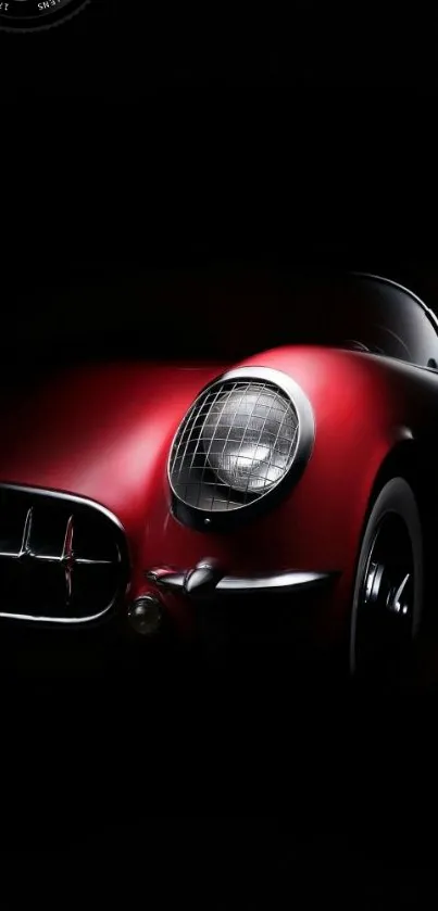 Red classic car on black background mobile wallpaper.