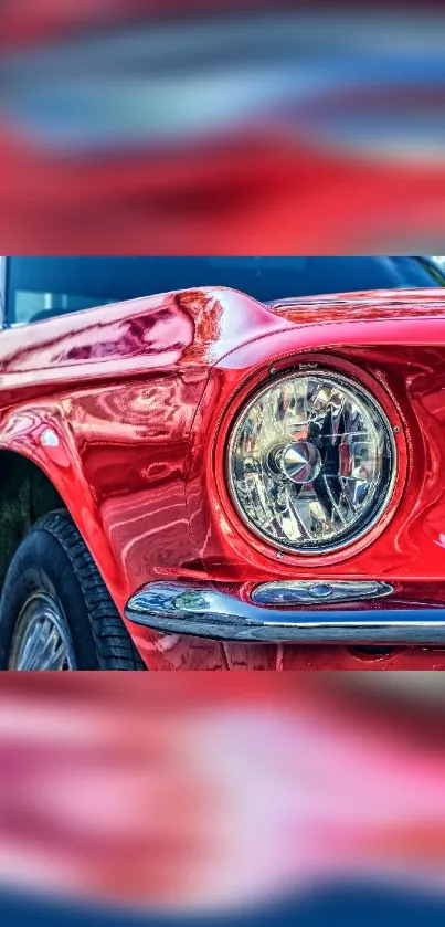 Close-up of a classic red vintage car, perfect for mobile wallpaper.