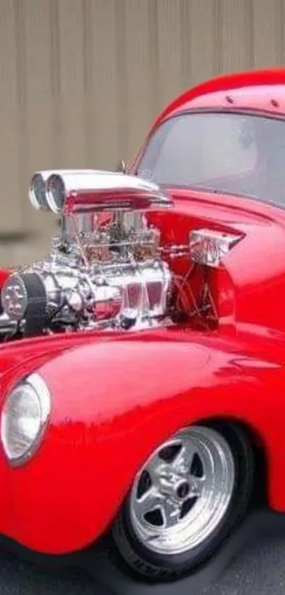 Classic red hot rod with polished chrome engine.