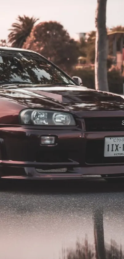 Classic Skyline car on a serene road with trees.