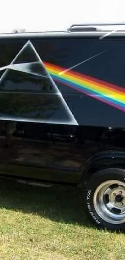 Classic van with prism and rainbow design on a black background.