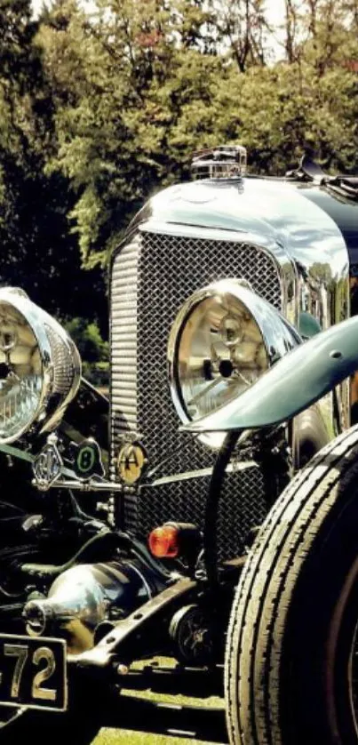 Vintage car with scenic background, featuring chrome and classic design.