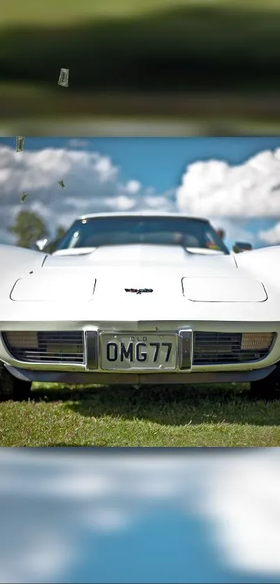 Front view of a classic white sports car on a sunny day.