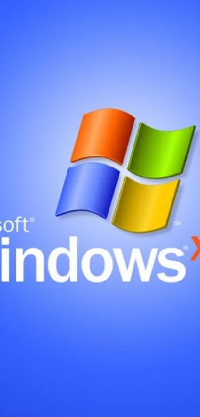 Windows XP logo on classic blue background wallpaper