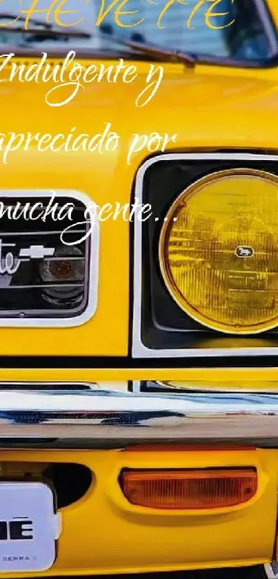 Close-up of a classic yellow car front with Chevette badge.