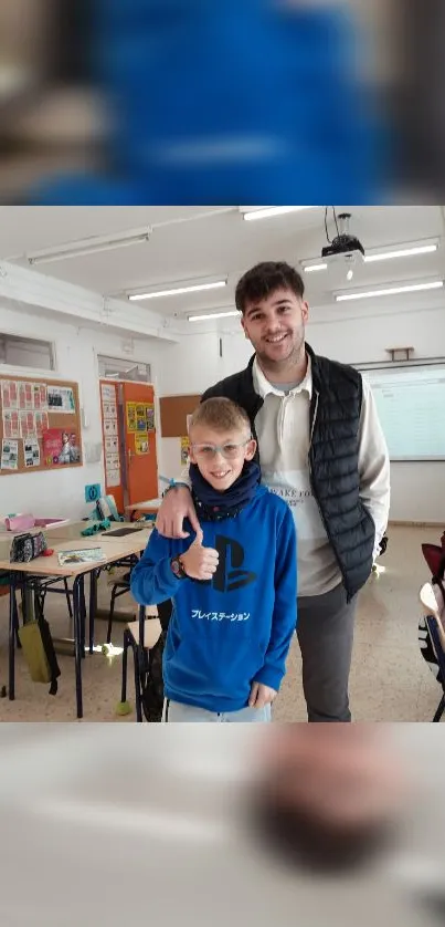 Teacher and student smiling in classroom.