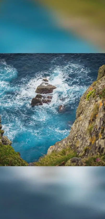 Breathtaking ocean view from rocky cliffs with vibrant blue waves.