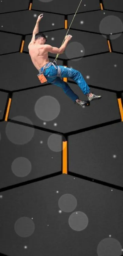 Climber scaling a hexagon-patterned wall with dynamic design.