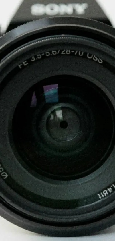 Close-up shot of a Sony camera lens, ideal for mobile wallpaper.