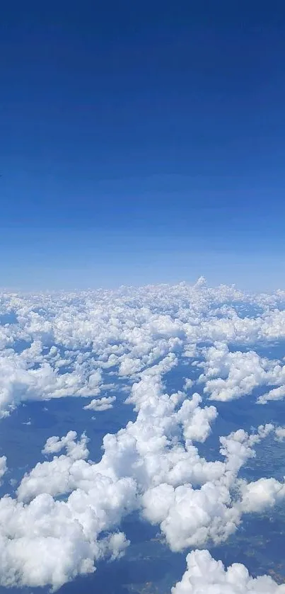 A stunning view of clouds against a vibrant blue sky from an airplane window.