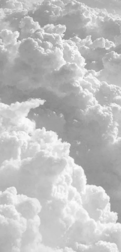 Soft grayscale clouds forming a serene, aesthetic mobile wallpaper background.