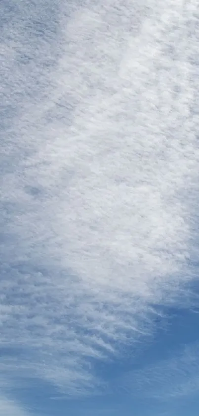 Wispy clouds on a blue sky mobile wallpaper.