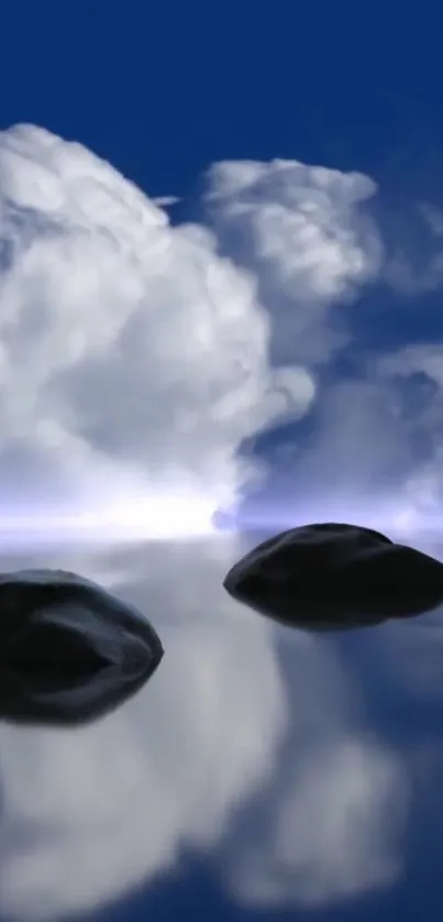 Beautiful clouds and rocks reflected on a calm water surface under a blue sky.