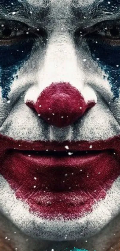 Clown face with vibrant colors and expressive makeup on a mobile wallpaper.