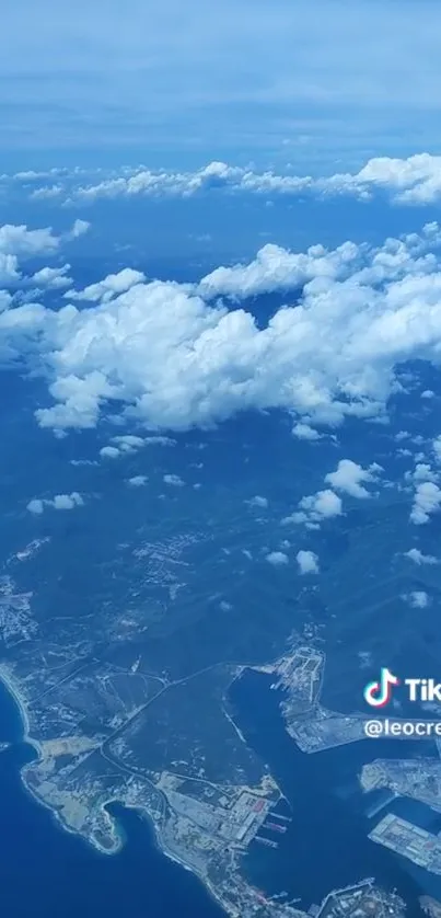 Aerial view of clouds above a coastline.