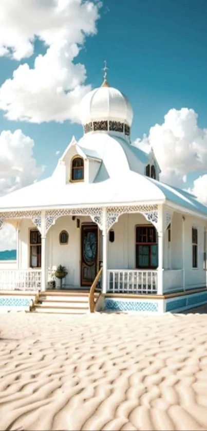 Beachfront cottage under a blue sky with clouds, ideal mobile wallpaper.