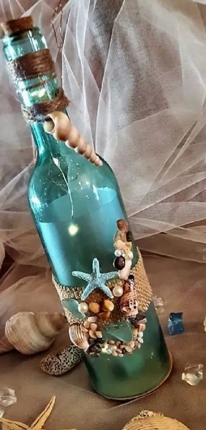 Decorative bottle with seashells and twine on a sandy background.