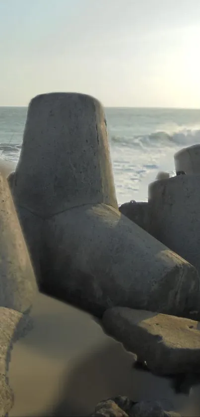 Concrete sea barriers against the ocean at sunset, offering tranquil scenery.