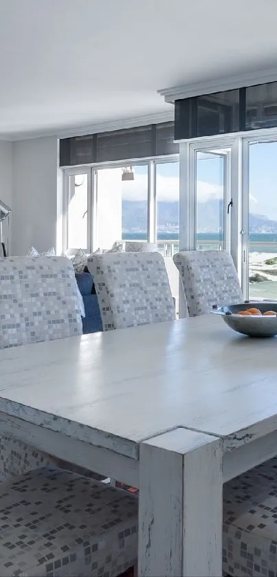 Sunlit coastal dining room with ocean view.