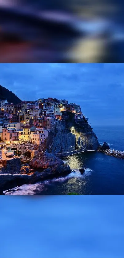 Coastal evening skyline with illuminated buildings and ocean view.