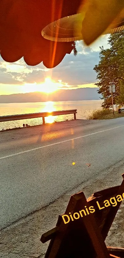 Sunset view over the road by the coast in warm orange tones.