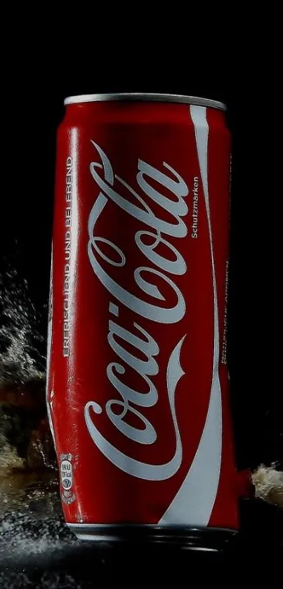 Vibrant Coca-Cola can with splash on black background.