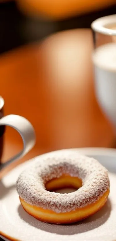 A cozy scene with a cup of coffee and a donut on a white plate.