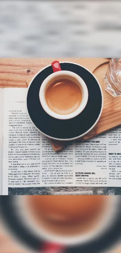 Espresso cup on newspaper with glass on wooden table.