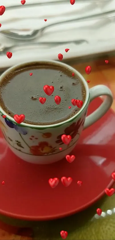 Coffee cup with heart bubbles on a red saucer.