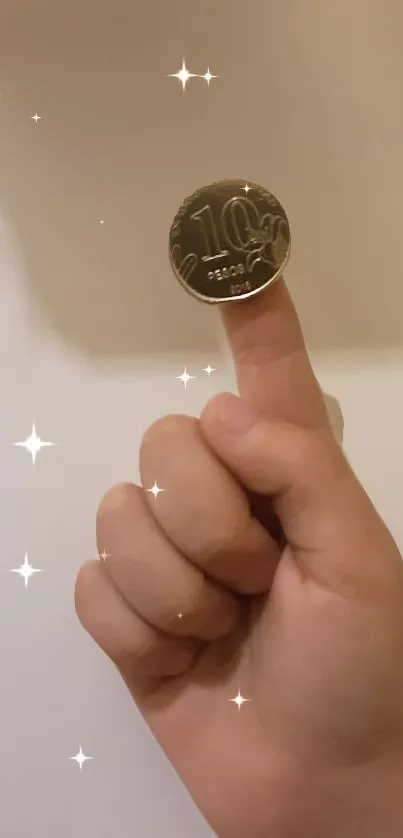 Coin balanced on a finger with a magical sparkling effect.