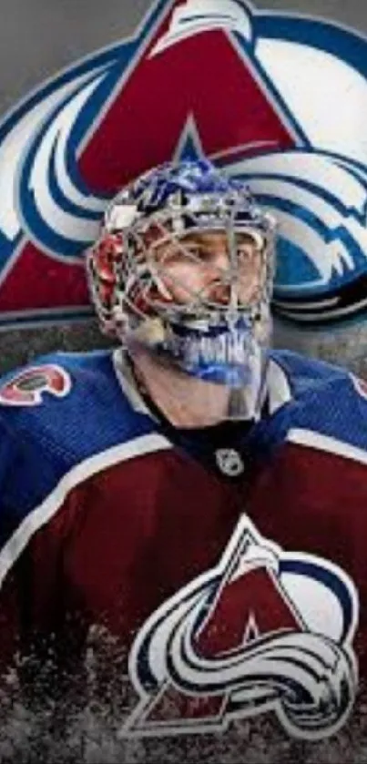 Colorado Avalanche hockey player with logo backdrop.