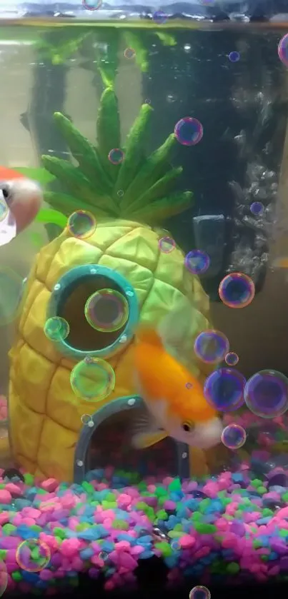 Colorful aquarium with goldfish and bubbles around a pineapple house.