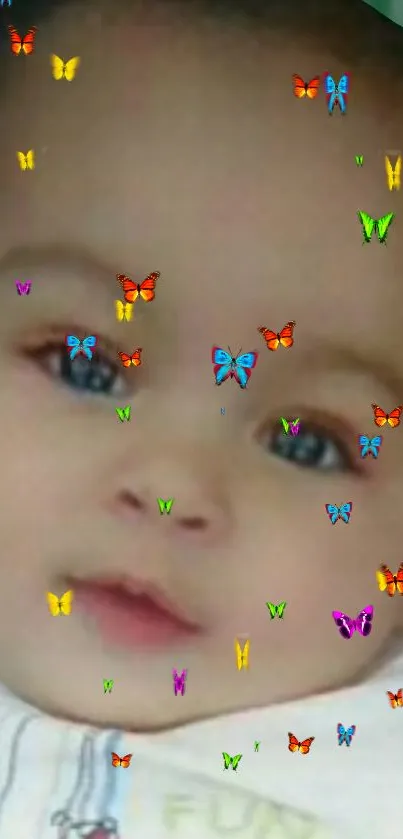 Cute baby face with colorful butterflies wallpaper.