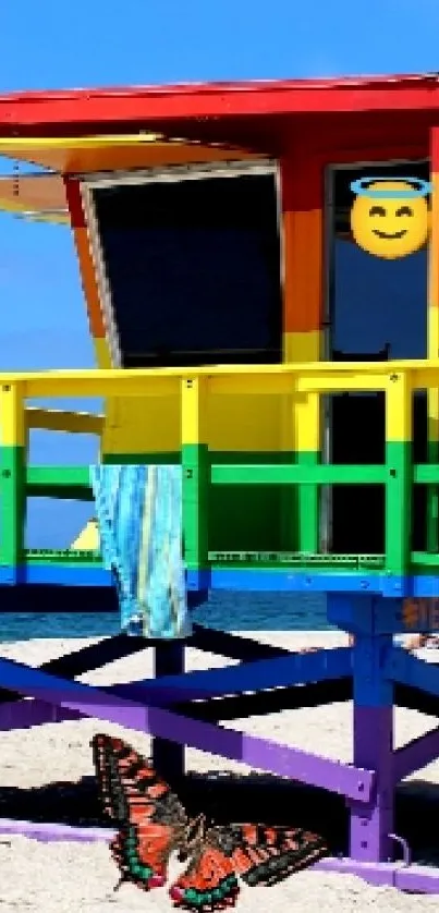 Rainbow lifeguard hut on a sunny beach.