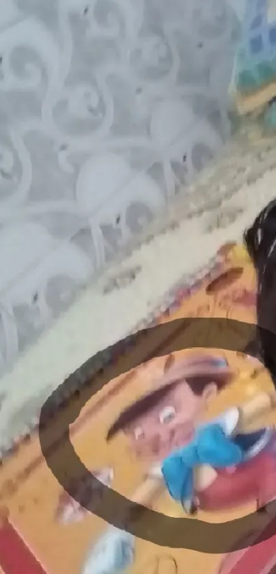 A child next to a colorful animated character pillow.
