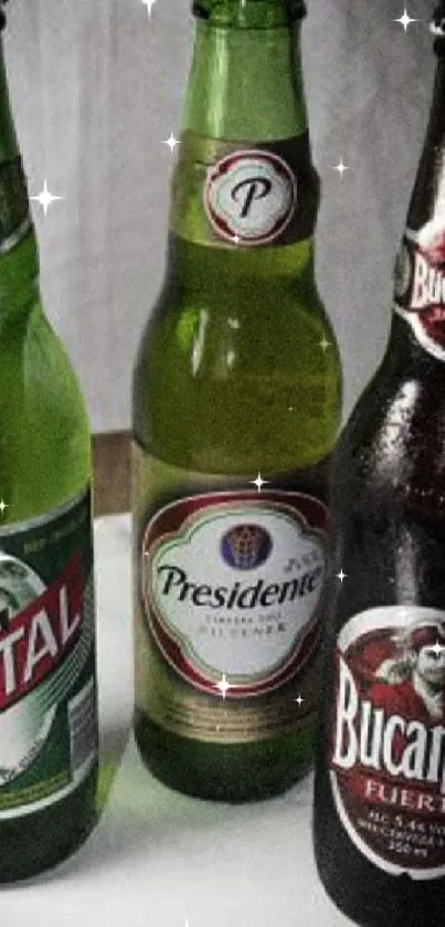 Three colorful beer bottles on display.