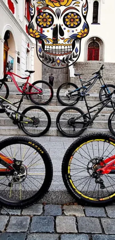 Bicycles and skull art on steps create colorful urban scene.